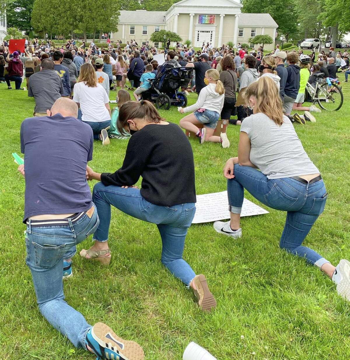 In Madison, a throng of more than 400 people gathered on the front lawn of The First Congregational Church for the Stand In Solidarity vigil which only lasted about 20 minutes.