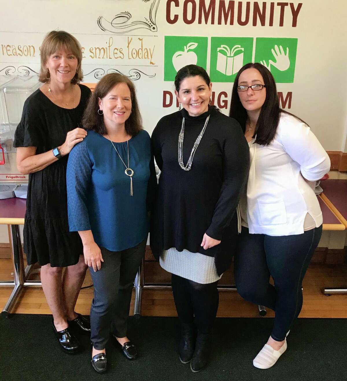 CDR kitchen coordinator Mary Johnston, volunteer coordinator Marie Mordarski, executive director Judy Barron, and administrative assistant Diana Vaicunas on a recent morning at the Community Dining Room.
