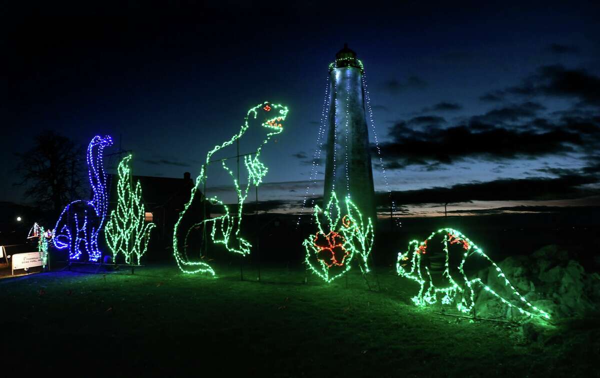 Dinosaur Park is one of 58 lighting exhibits at Fantasy of Lights at Lighthouse Point Park in New Haven hosted here in 2018.