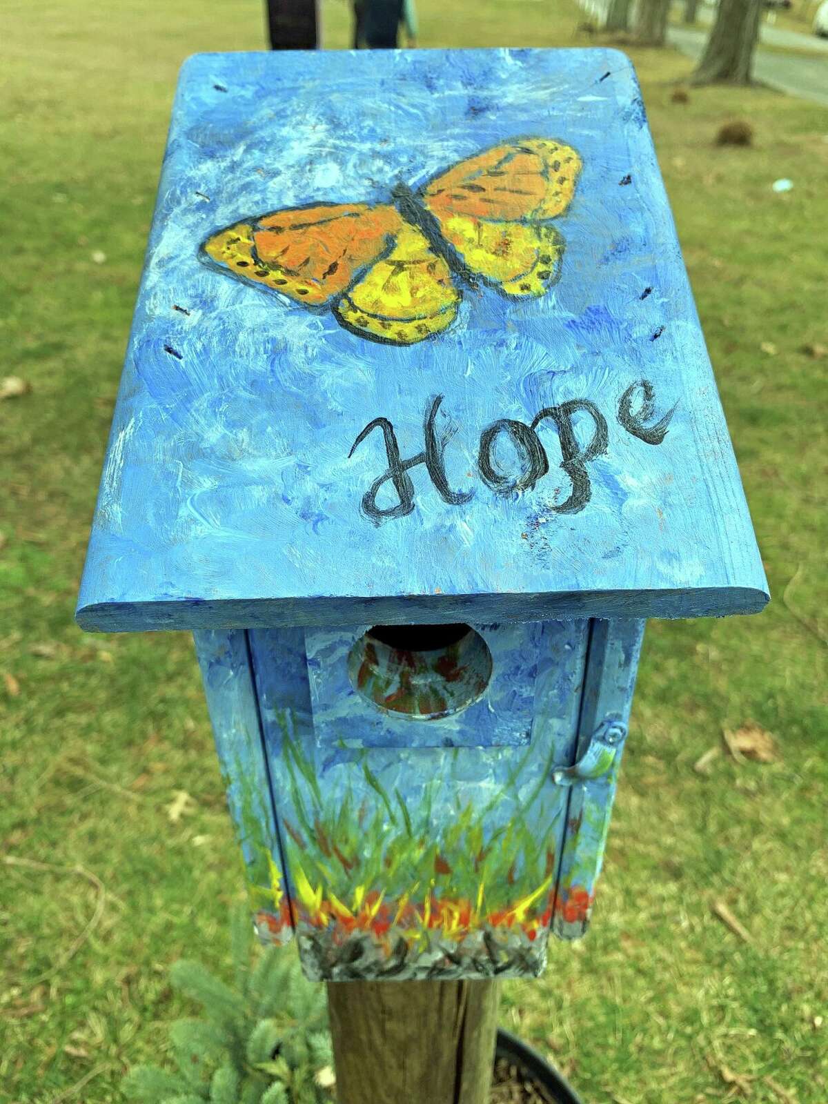 Message of hope on this gaily painted Heart House.