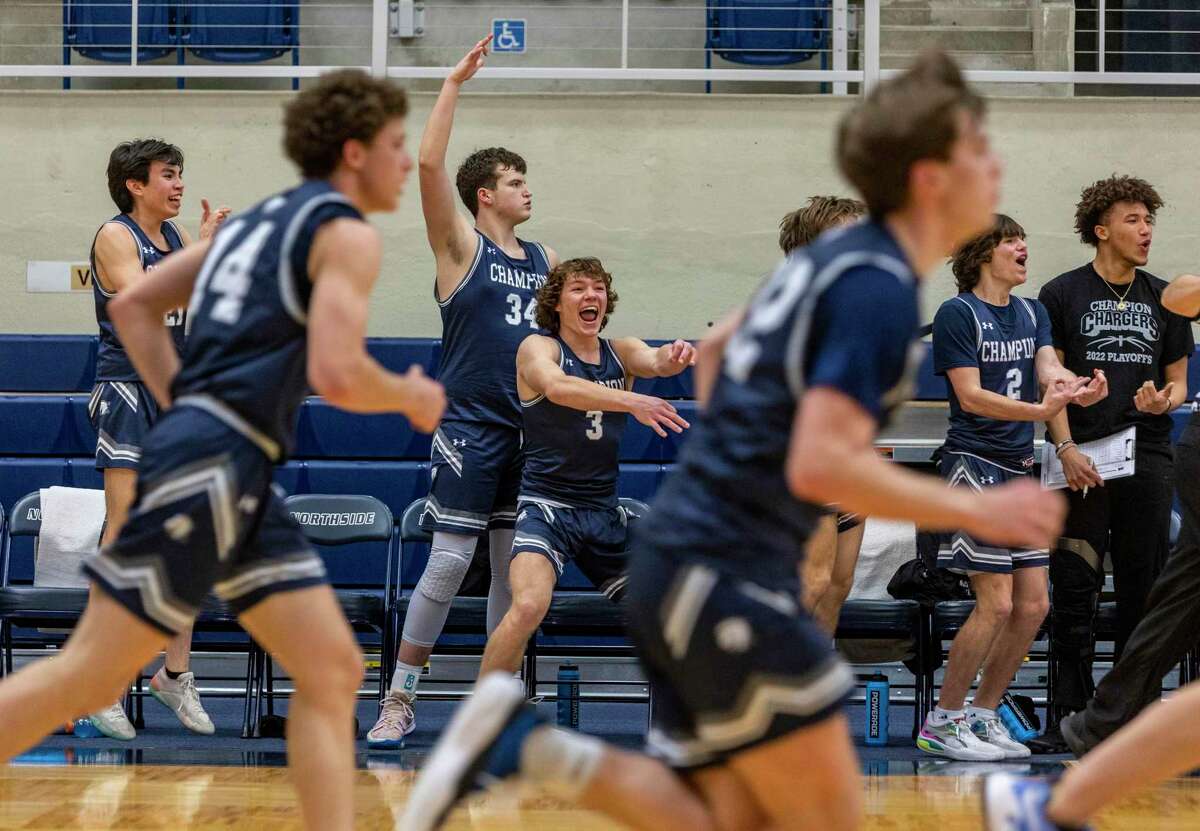 The Boerne Champion bench erupts Friday, Feb. 25, 2022 at Paul Taylor Field House as Champion expands their lead over Jefferson during their Class 5A playoff game.