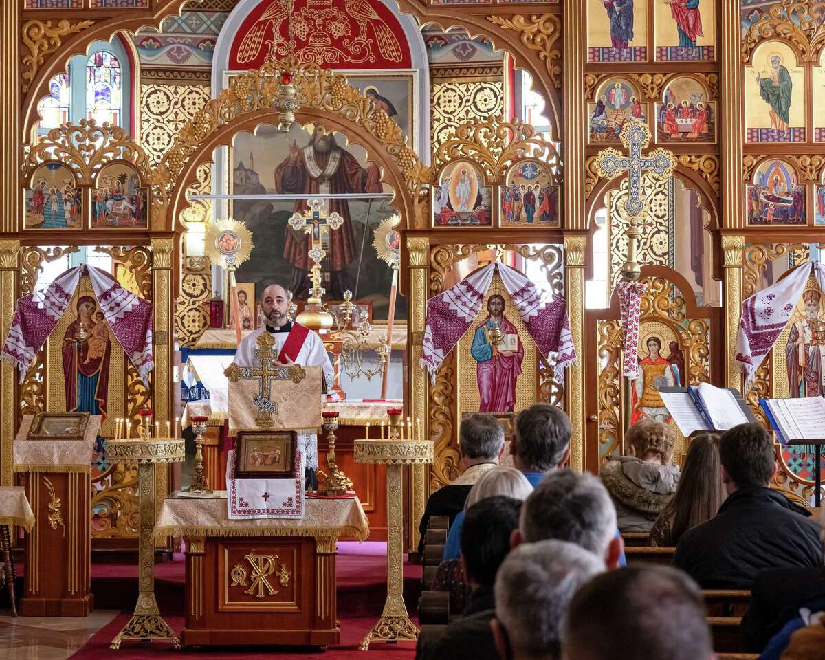 Deacon James Agnew, of the Roman Catholic Diocese of Albany, speaks at the St. Nicholas Ukrainian Orthodox Church in Troy, NY, on Saturday, Feb. 26, 2022 during a prayer service for Ukraine and its people as the country faces an invasion from Russia. (Jim Franco/Special to the Times Union)