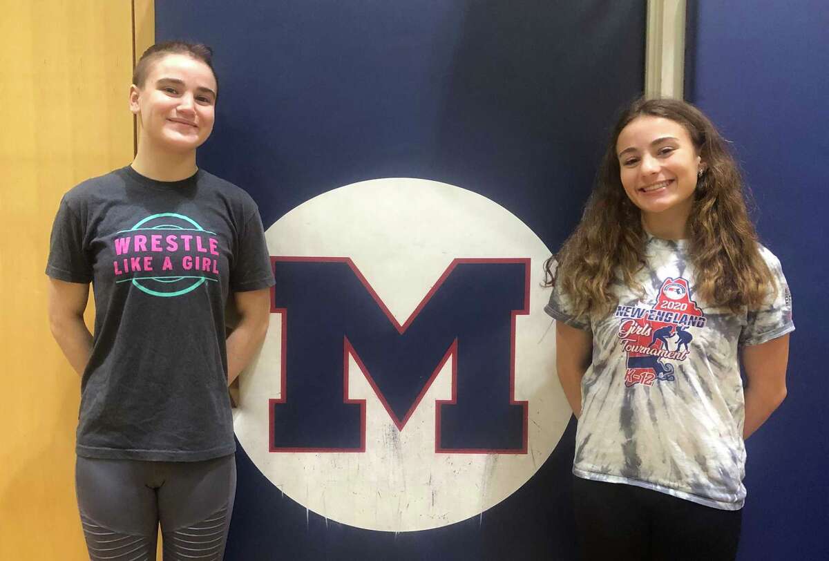 Cousins Calli, left, and Maren Gilchrist of the Brien McMahon wrestling team will compete in the CIAC Girls State Tournament in New Haven on this weekend.