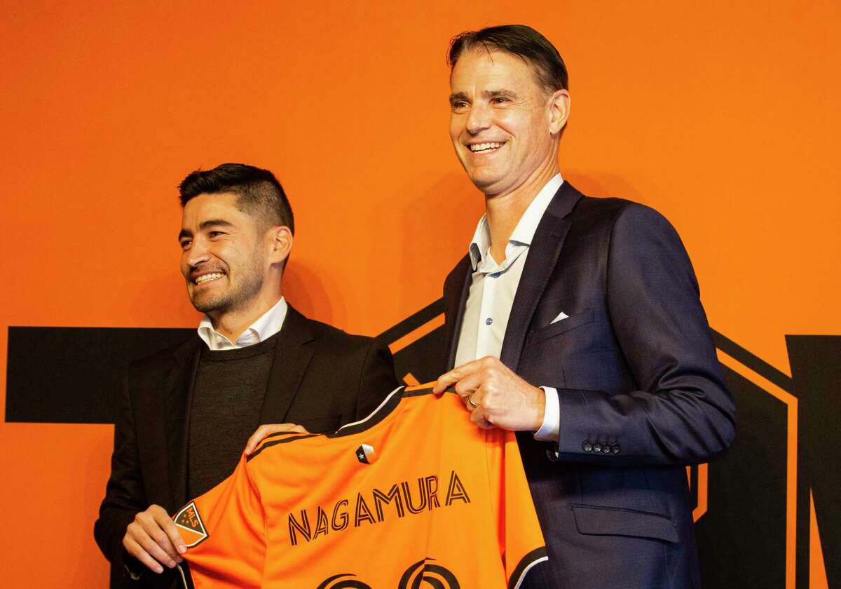 First-year Dynamo general manager Pat Onstad (right), with new coach Paulo Nagamura, isn’t hesitant to state that making the playoffs is an immediate goal for the revamped MLS franchise.