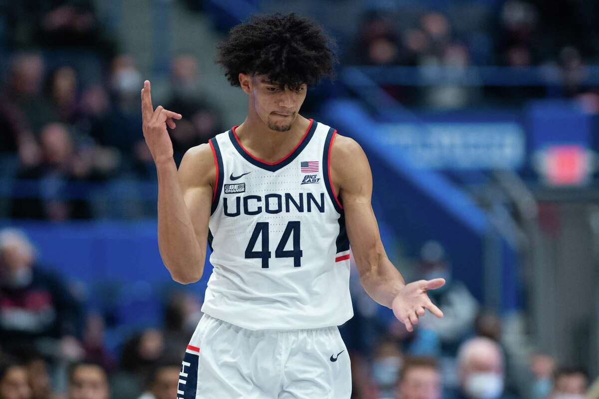 HARTFORD, CT - JANUARY 18: UConn Huskies guard Andre Jackson (44) celebrates after making a three pointer during the mens college basketball game between the Butler Bulldogs and UConn Huskies on January 18, 2022, at XL Center in Hartford, CT. (Photo by Zach Bolinger/Icon Sportswire via Getty Images)