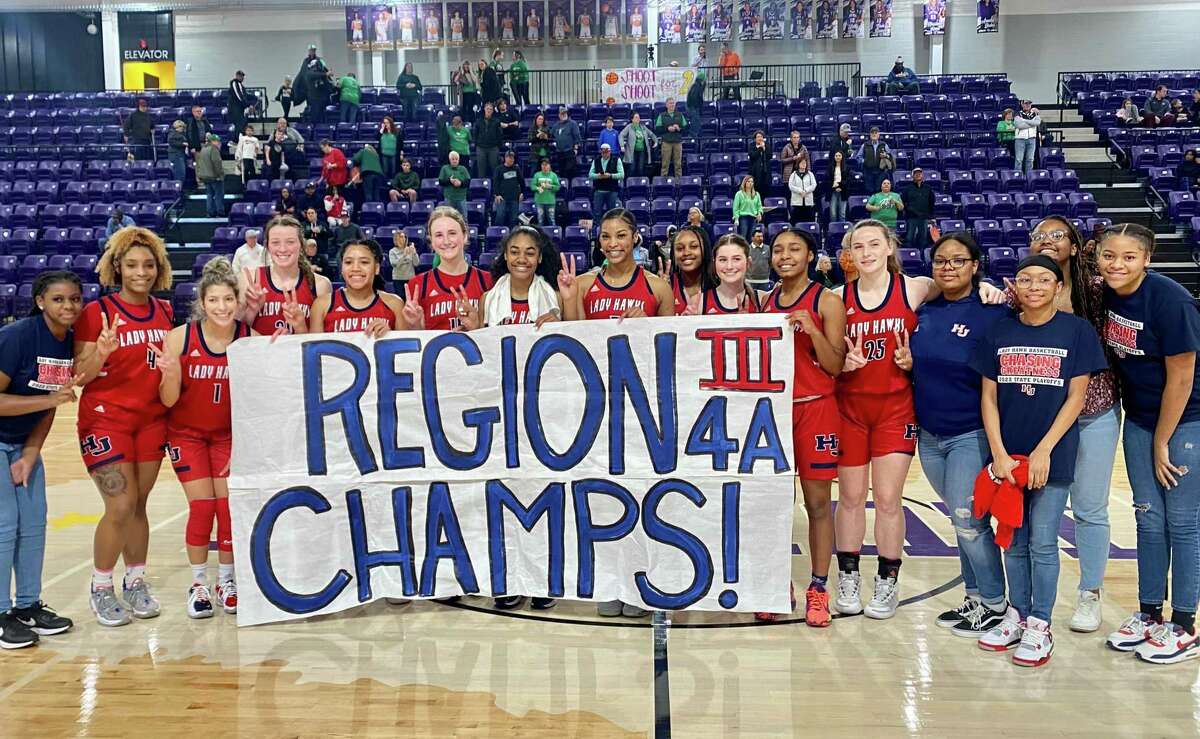 The Hardin-Jefferson girls basketball team poses for a picture after its regional-championship victory over Burnet on Saturday in Lufkin.