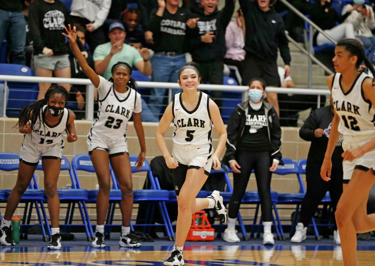 Clark bench cheer after guard Ramsey Noelle Robledo (5) hit a three pointer in the second half. Region IV-6A girls basketball championship on Saturday, Feb. 26,2022 at Northside Gym. Clark defeated Steele 52-49.