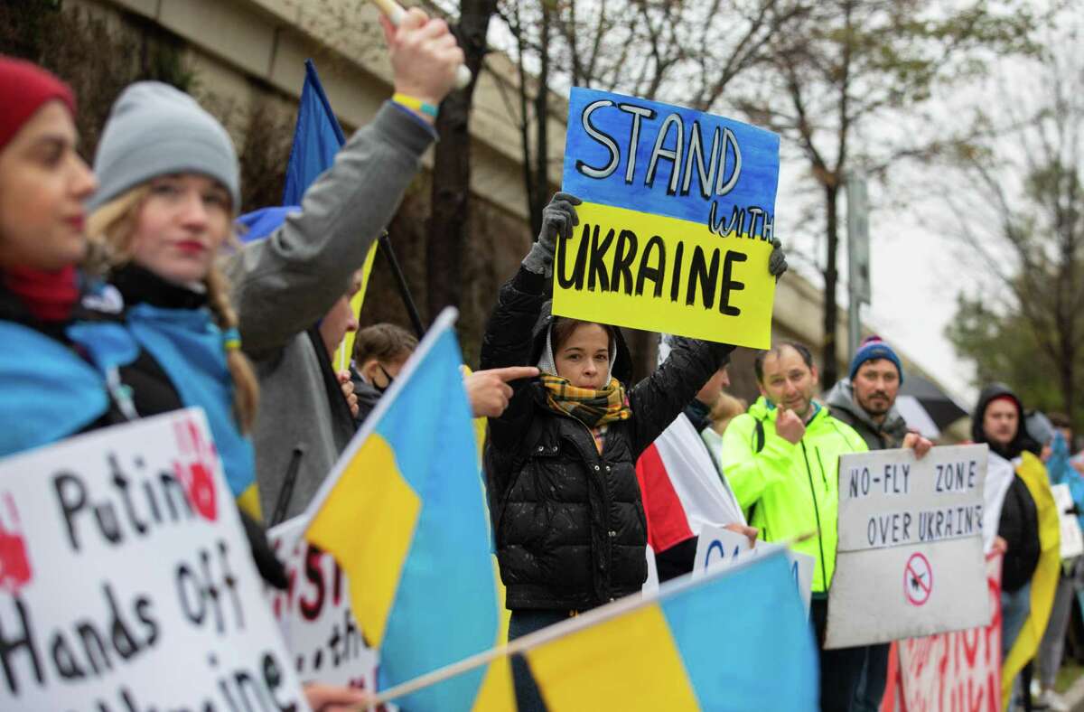 Three Ukranians in Texas, united on the 610 feeder with concern for family