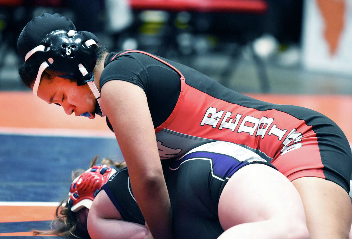 Antonia Phillips of Alton, top, finished first in the 145-pound division at Wednesday's Crimson Ladies Holiday Invite in Jacksonville. Phillips, the defending 145-pound state champion, is shown in action from last season.  