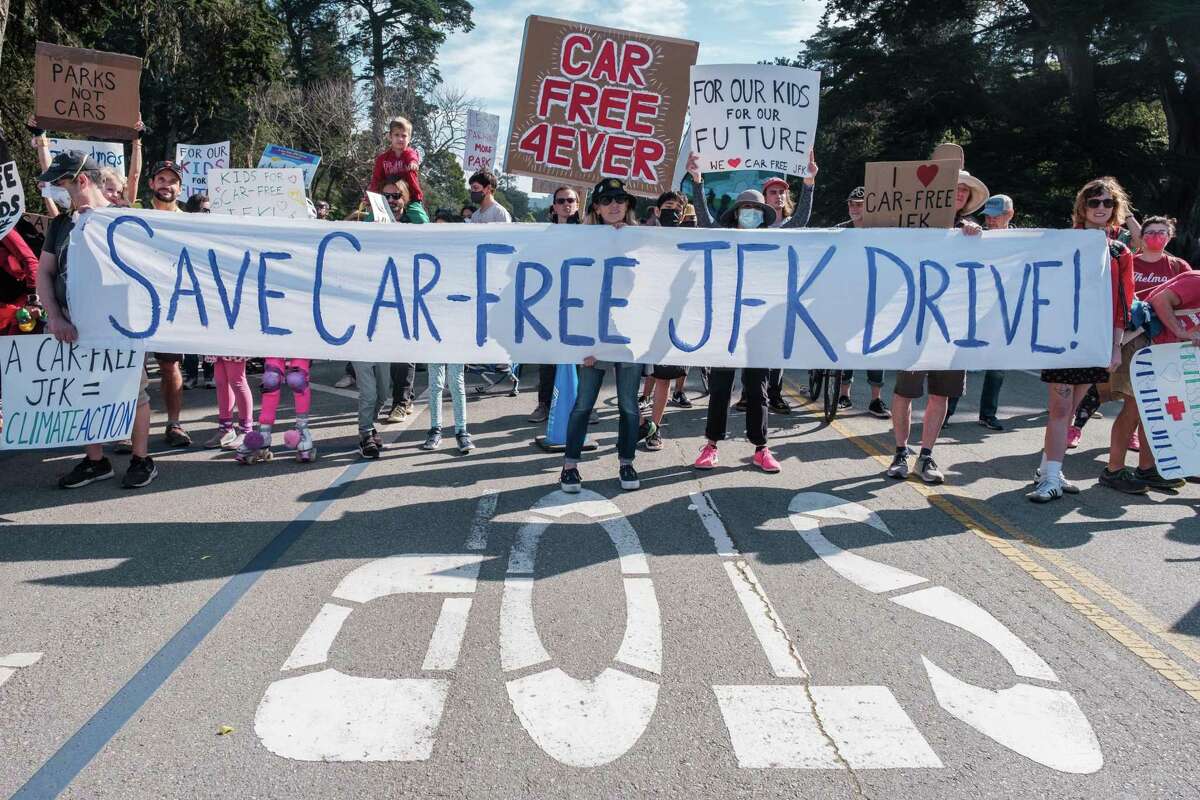 Hundreds of people march and ride during a “Save JFK” rally in Golden Gate Park on February 12, 2022. Members of Walk SF organized the “Save JFK” rally to garner support in an effort to keep JFK Drive car free.