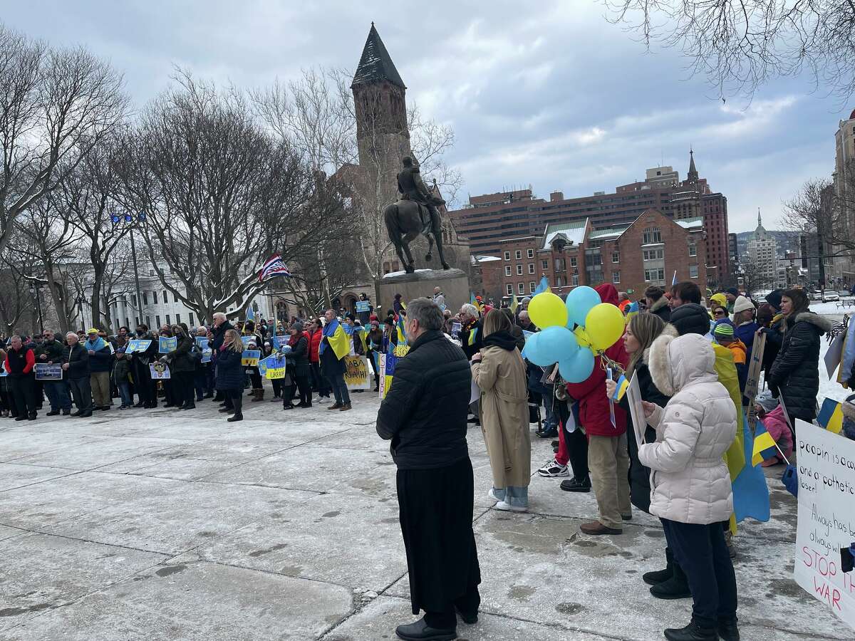 Demonstrators gathered in front of the state Capitol on Sunday, Feb. 27, 2022 to denounce Russia’s invasion of Ukraine and to show solidarity with the nation.