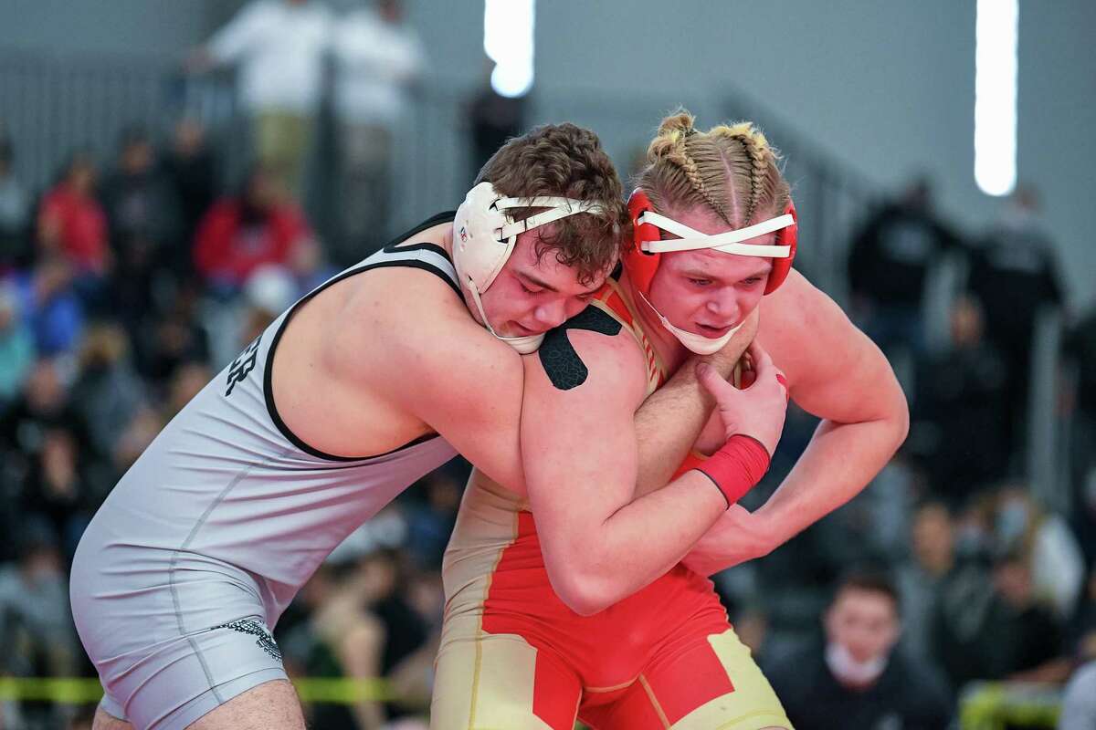 Xavier's Thomas Lunt and Stratford's James Duhancik wrestle in the 220 lb final at the CT State Wrestling Open at the Floyd Little Fieldhouse in New Haven, February 27, 2022.