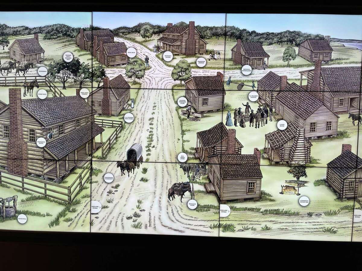An interactive panel at the San Felipe de Austin State Historic Site depicts the town as it would have looked before it was burned to the ground in 1836.