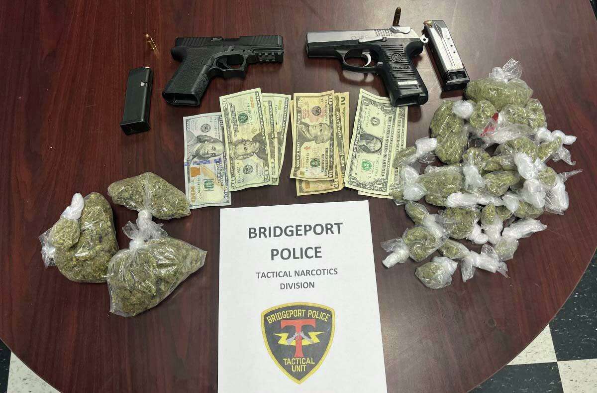 A Bridgeport man faces multiple charges after officers found him with a ghost gun, another gun with an obliterated serial number and drugs packaged for sale during a vehicle stop in Bridgeport, Conn., on Friday, Feb. 25, 2022.
