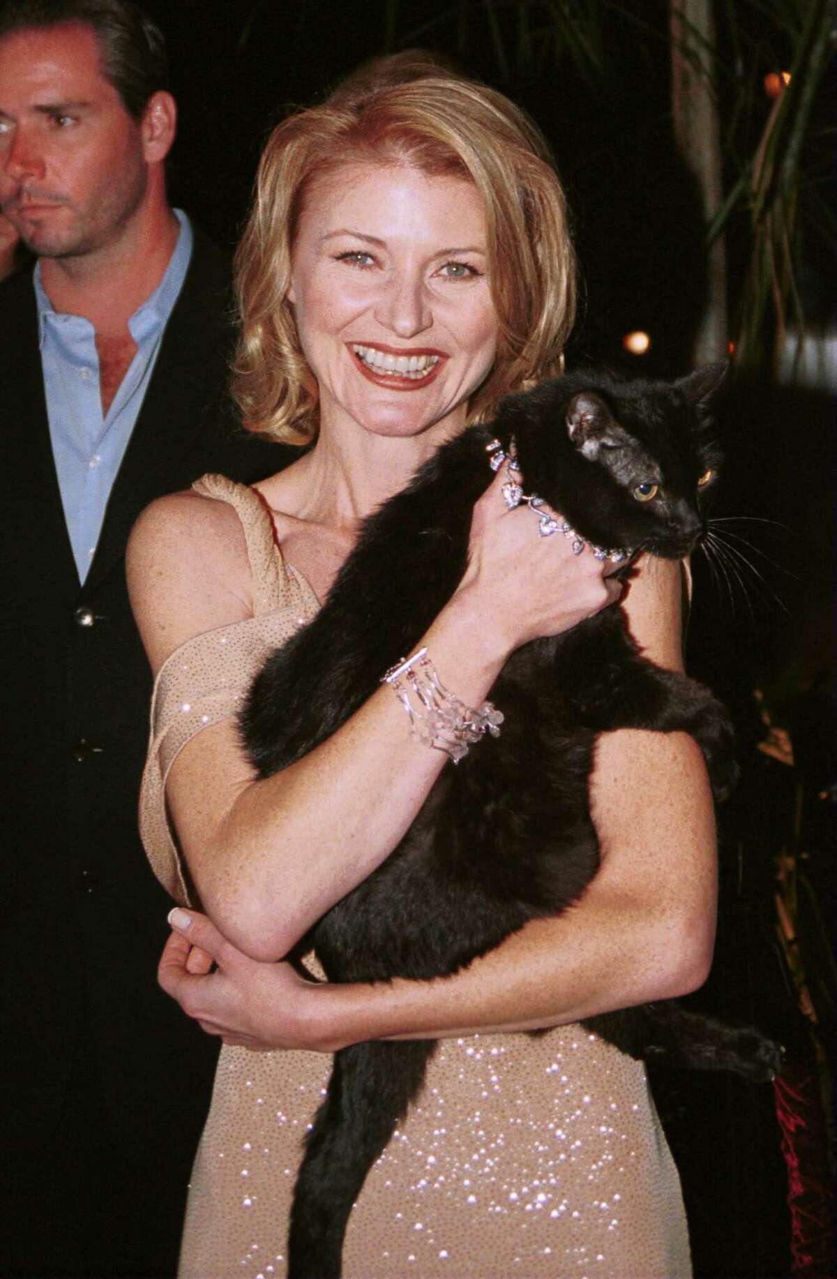 Actress Beth Broderick and the cat Salem arrive for the 100th party of Episode for "Sabrina, the teenage witch" at the Sunset Room on October 23, 2000 in Hollywood, CA.  (Photo by Frederick M. Brown/Online)