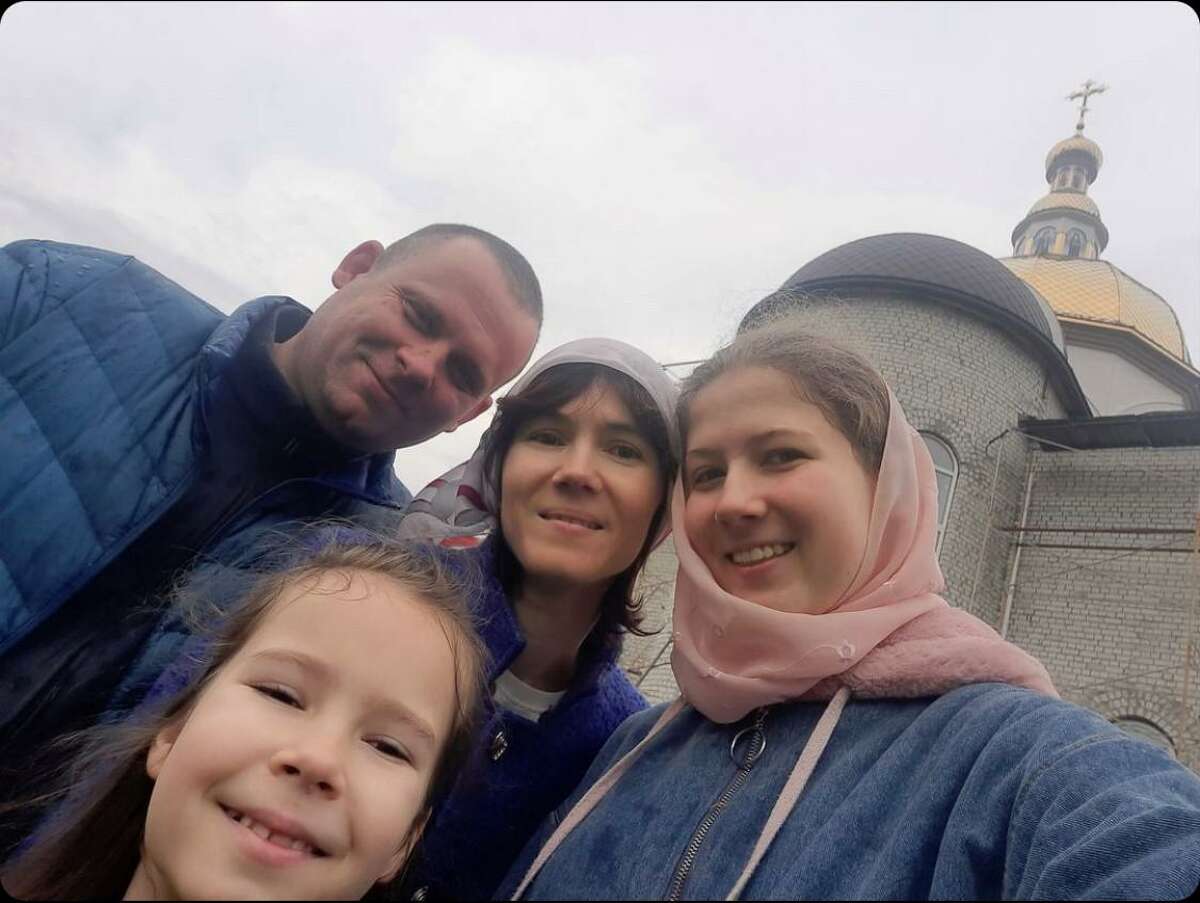 Anya Arseienko’s host family is raising money to help her family, pictured, get to safety from Ukraine.