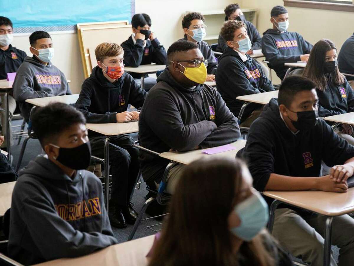 Students wear masks during the first day of in-person learning at Riordan High School in San Francisco in August 2021. Riordan is among the city’s private schools lifting the mask mandate starting Monday.