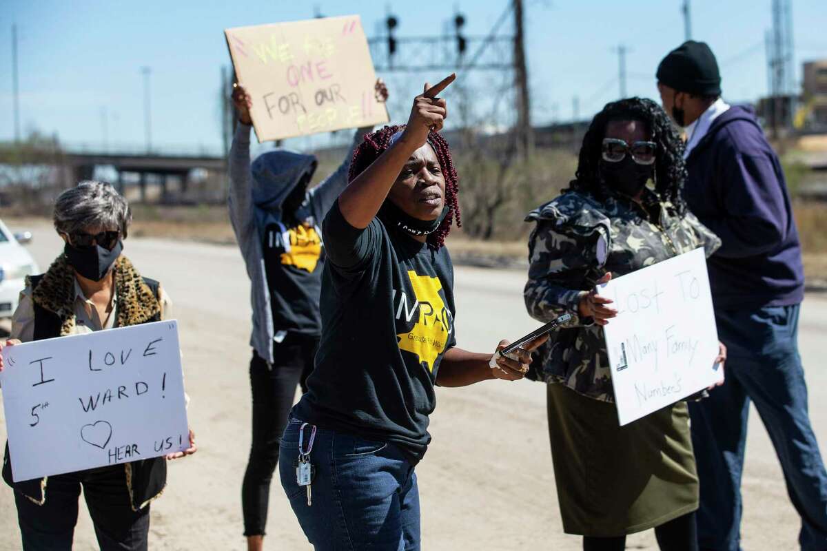 Sandra Edwards chants as she joins a group of Fifth Ward residents protesting environmental pollution by Union Pacific Monday, Feb. 28, 2022 in Houston.