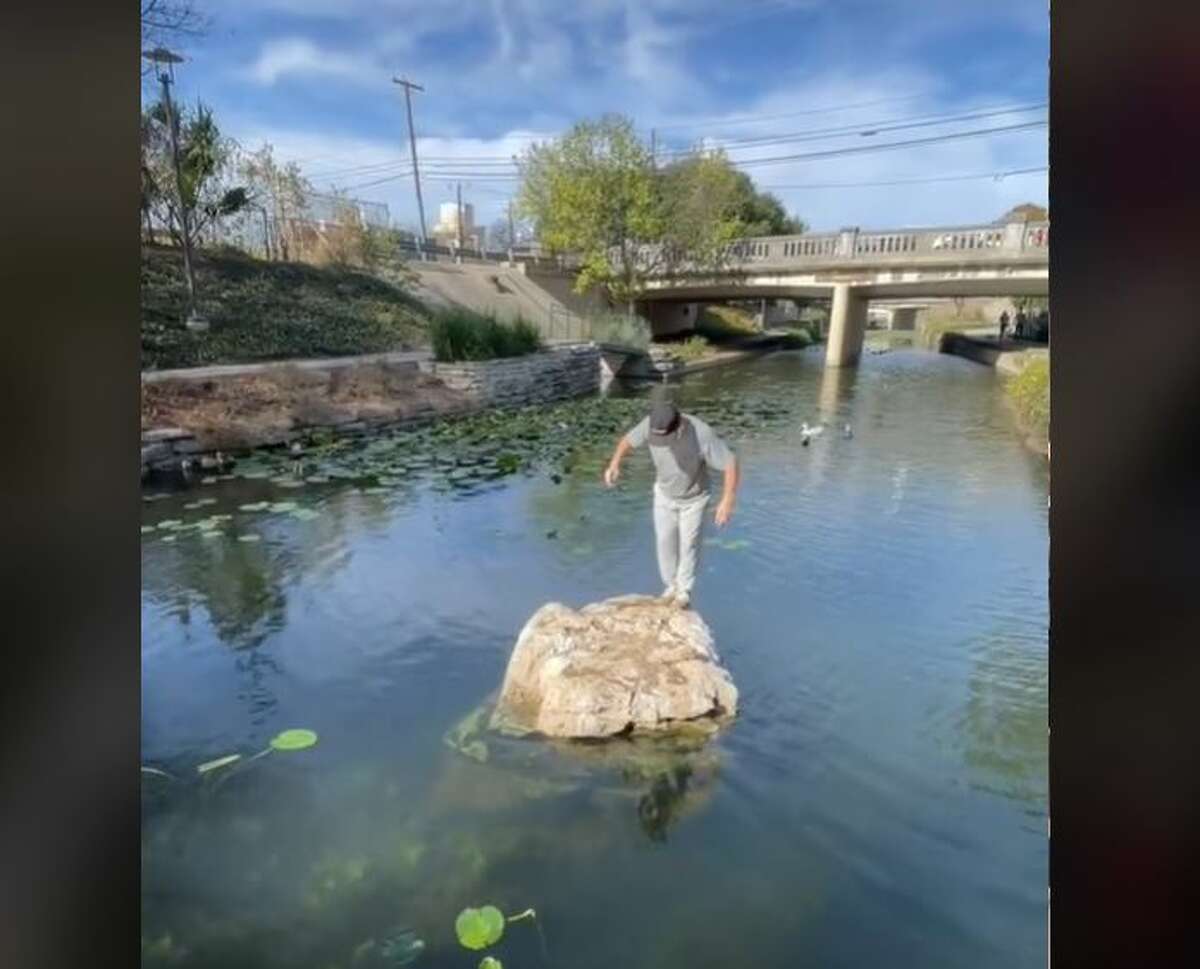 Reagan Popoff, a 21-year-old amateur parkour athlete from Dallas, stunned restaurant-goers along the River Walk, near the Pearl, with his impressive jump from a rock in the water to the pavement. 