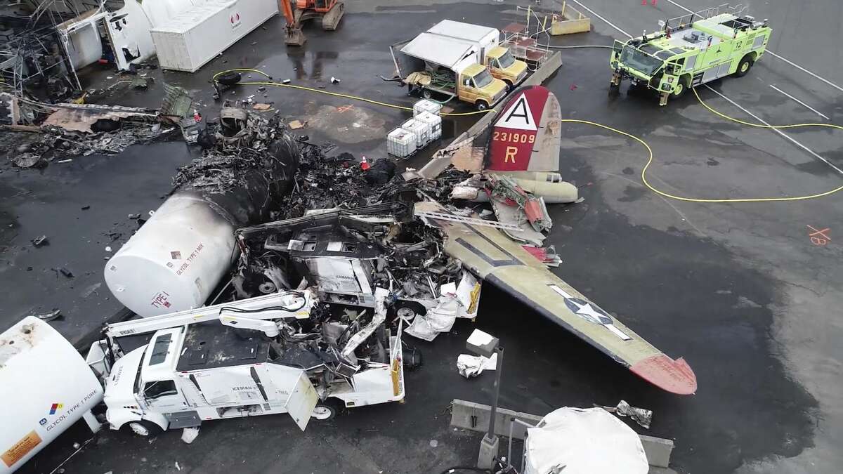 This image taken from video provided by National Transportation Safety Board shows damage from a World War II-era B-17 bomber plane that crashed Wednesday at Bradley International Airport, Thursday, Oct. 3, 2019 in Windsor Locks, Conn. The plane crashed and burned after experiencing mechanical trouble on takeoff Wednesday morning from Bradley International Airport. (NTSB via AP)