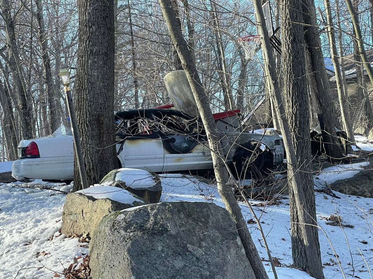Fire crews responded to a Fawn Crest Drive home in New Fairfield, Conn., around 3:05 p.m. Monday, Feb. 28, 2022, and extinguished a car blaze, officials said.