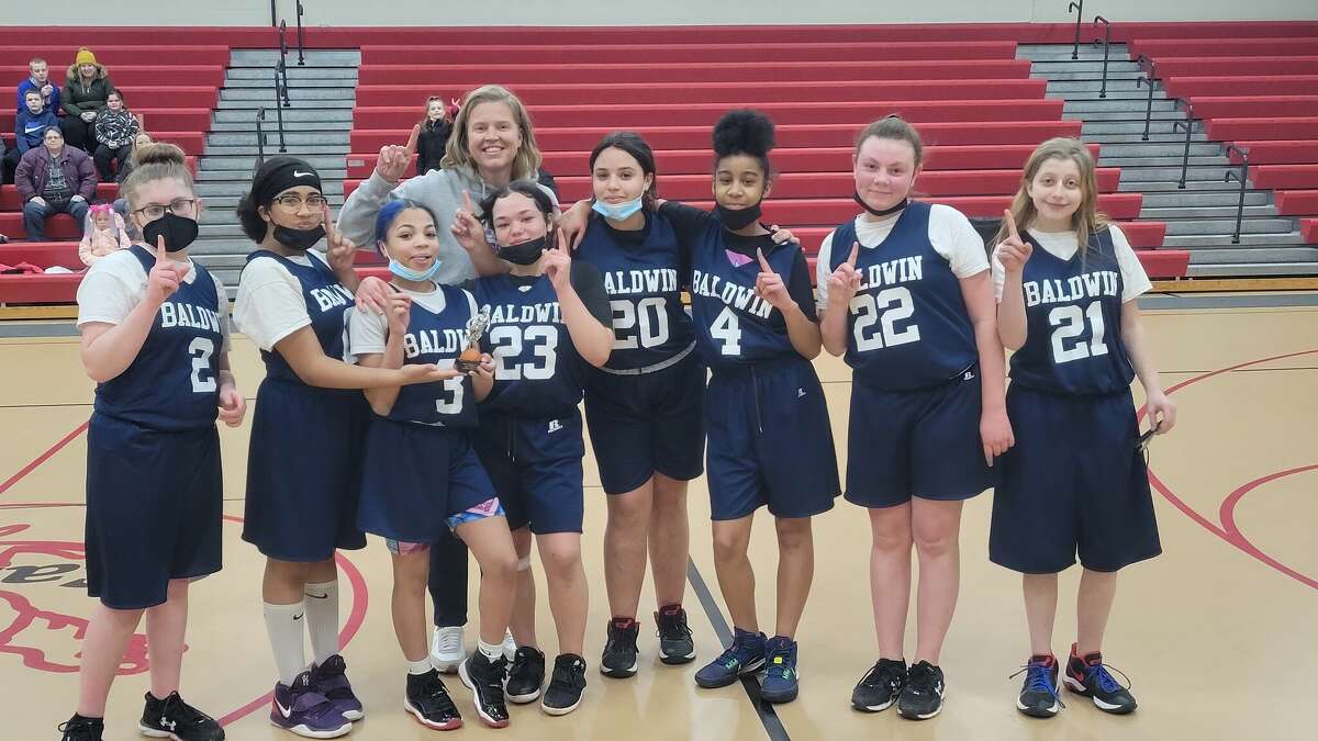 Pictured (from left to right) are Baldwin middle school basketball team members are: Emmalie Simmons, Monica Perfitt, Khloe Toliver, Brenda Hull-Saunders, Nyla Robinson, Ra'Kyah Smith, Hailie Simmons and Ruthann Copeland. The team is coached by Nikki Bergman.