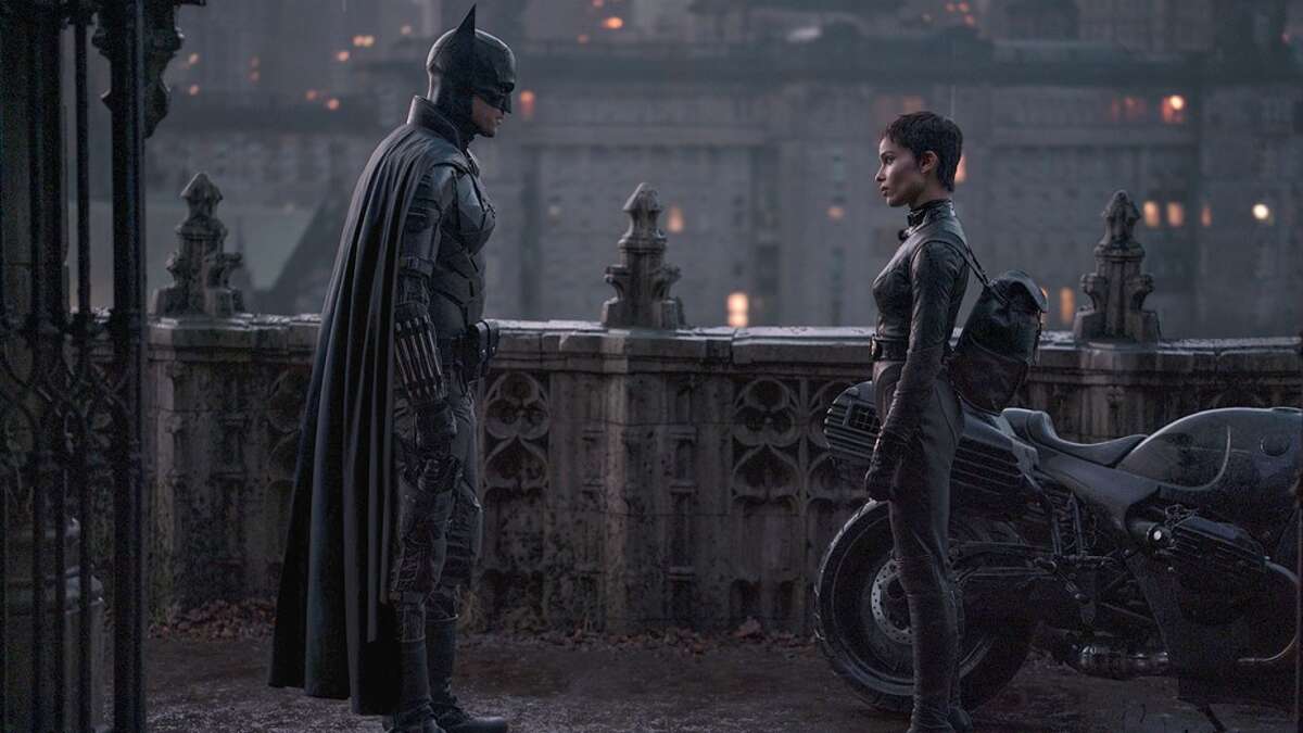 Batman (Robert Pattinson) and Catwoman (Zoë Kravitz) team up in the super-dark -- and super-long -- "The Batman," from writer-director Matt Reeves ("Cloverfield," "War for the Planet of the Apes").  