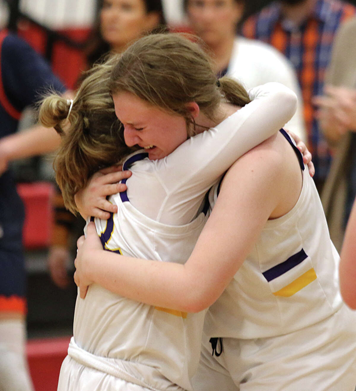 CM's Olivia Durbin (left) and Aubree Wallace celebrate their victory on Monday night in the Highland Class 3A Super-Sectional.