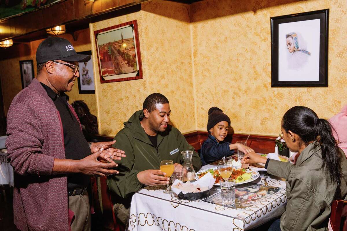 Kesete Yohannes (left) opened the Ethiopian and Eritrean restaurant Asmara along with his wife Okba Yohannes in 1985. Their sons Benyam and Yonathan Keste Yohannes are now starting a new chapter for the establishment.