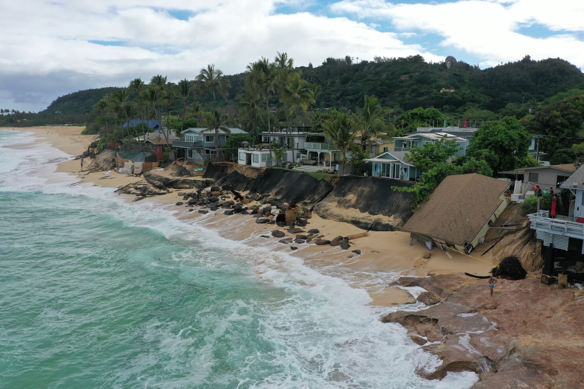 Home collapses on Hawaii's North Shore, more likely to follow