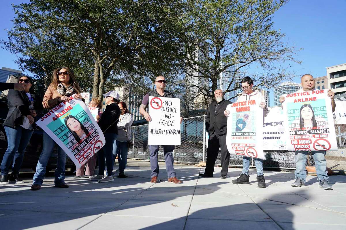People rally outside of the Harris Co. Criminal Justice Center against gun violence Tuesday, March 1, 2022 in Houston.