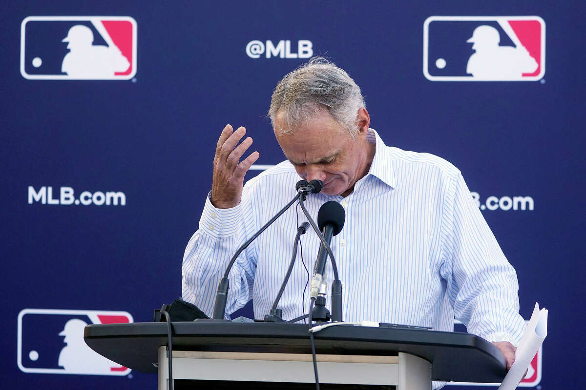 Major League Baseball Commissioner Rob Manfred answers questions during a news conference after negotiations with the players' association toward a labor deal, Tuesday at Roger Dean Stadium in Jupiter, Fla. Manfred said he is canceling the first two series of the season which was set to begin March 31, dropping the schedule from 162 games to likely 156 games at most.