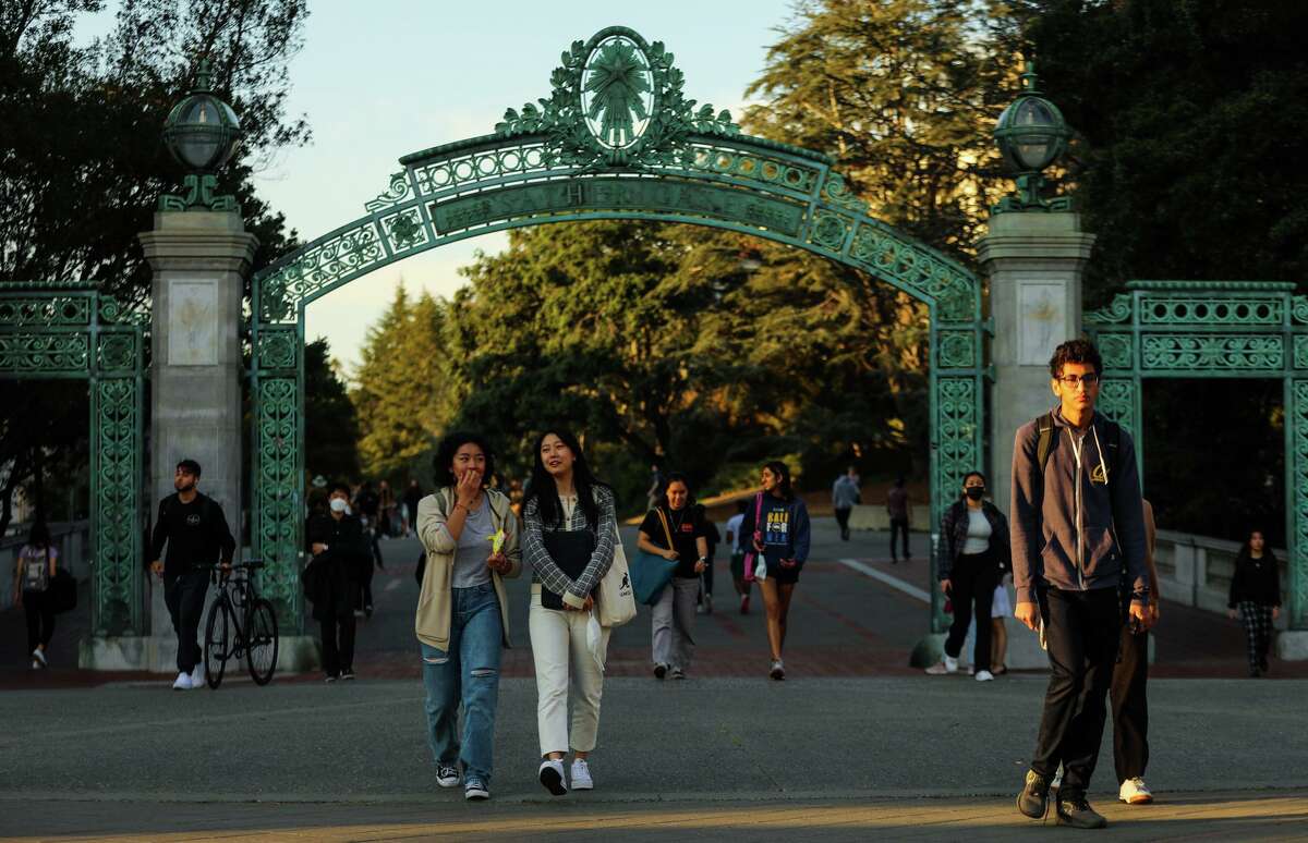 Student pass through Sather Gate on the UC Berkeley campus.