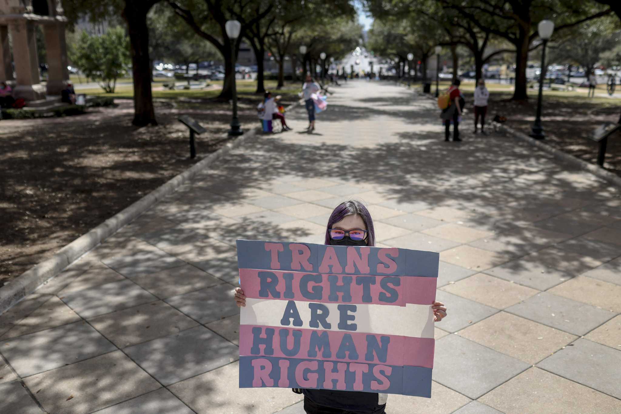 Opinion: On transgender issues, Paxton and Abbott lead with hate