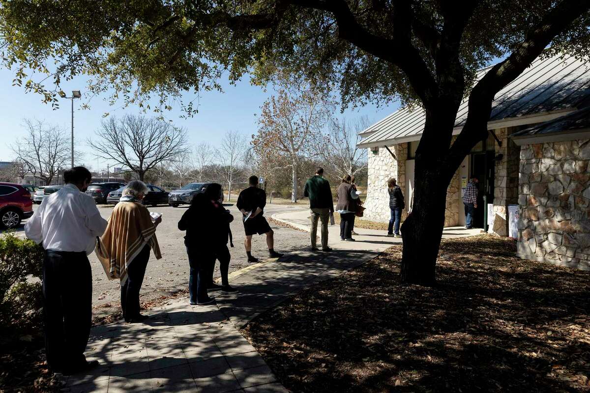 Voters wait in line to cast their votes at Lion’s Field, one of the many locations you can go to during early voting.