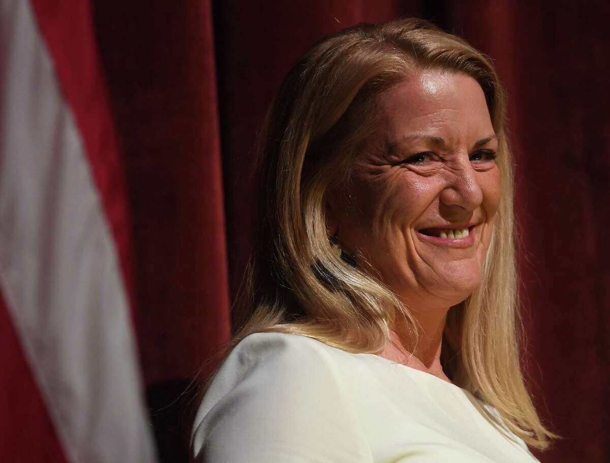 Fairfield First Selectwoman Brenda Kupchick smiles as she delivers her address during the Oath of Office Ceremony at Warde High School in Fairfield, Conn. on Monday, November 25, 2019.
