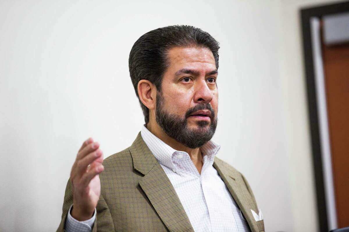 Harris County Precinct 2 Commissioner Adrian Garcia speaks during a press conference last month. Garcia faces two Democratic challengers in Tuesday’s primary elections.