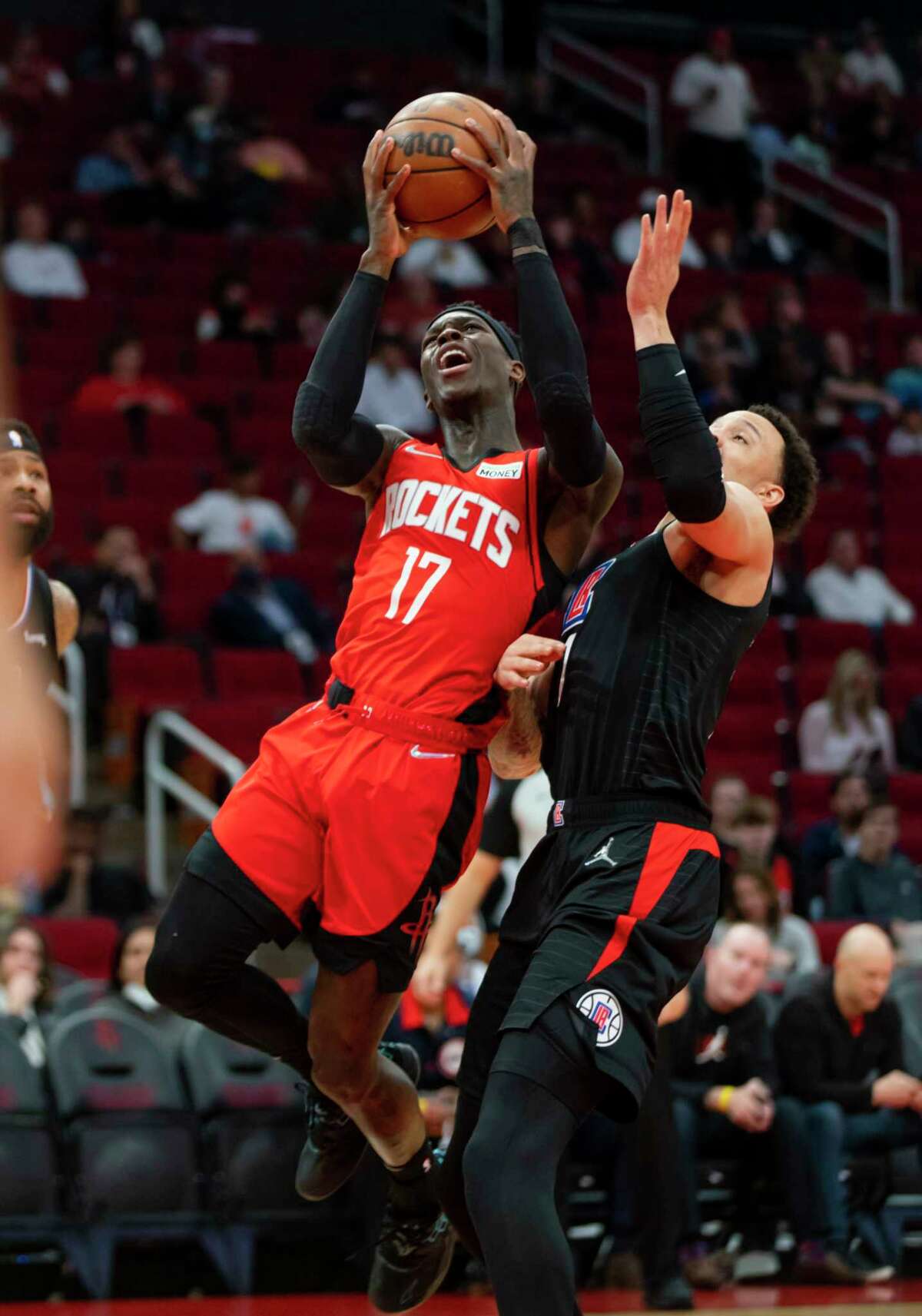 Houston Rockets guard Dennis Schroder (17) shoots during the first half of an NBA game between the Houston Rockets and Los Angeles Clippers, Tuesday, March 1, 2022, at Toyota Center in Houston.