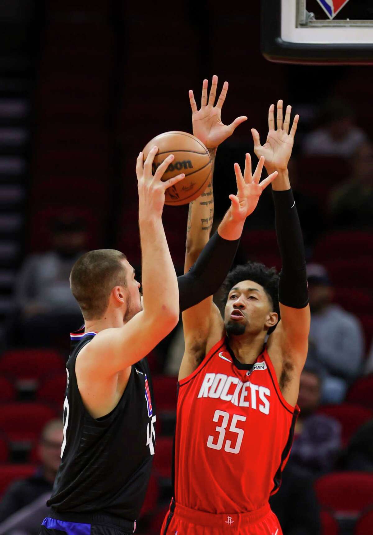 Houston Rockets center Christian Wood (35) defends against Los Angeles Clippers center Ivica Zubac (40) during the first half of an NBA game between the Houston Rockets and Los Angeles Clippers, Tuesday, March 1, 2022, at Toyota Center in Houston.