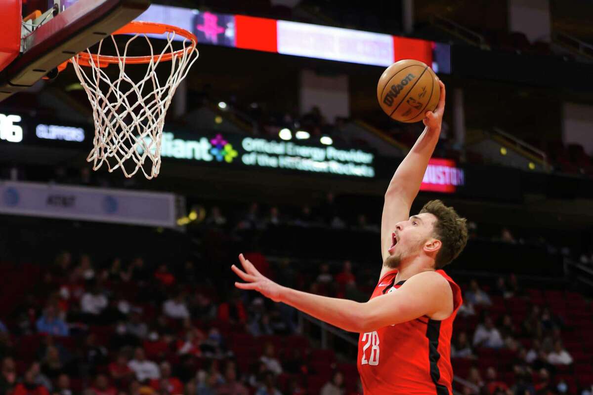 Houston Rockets center Alperen Sengun (28) dunks during the second half of an NBA game between the Houston Rockets and Los Angeles Clippers, Tuesday, March 1, 2022, at Toyota Center in Houston.