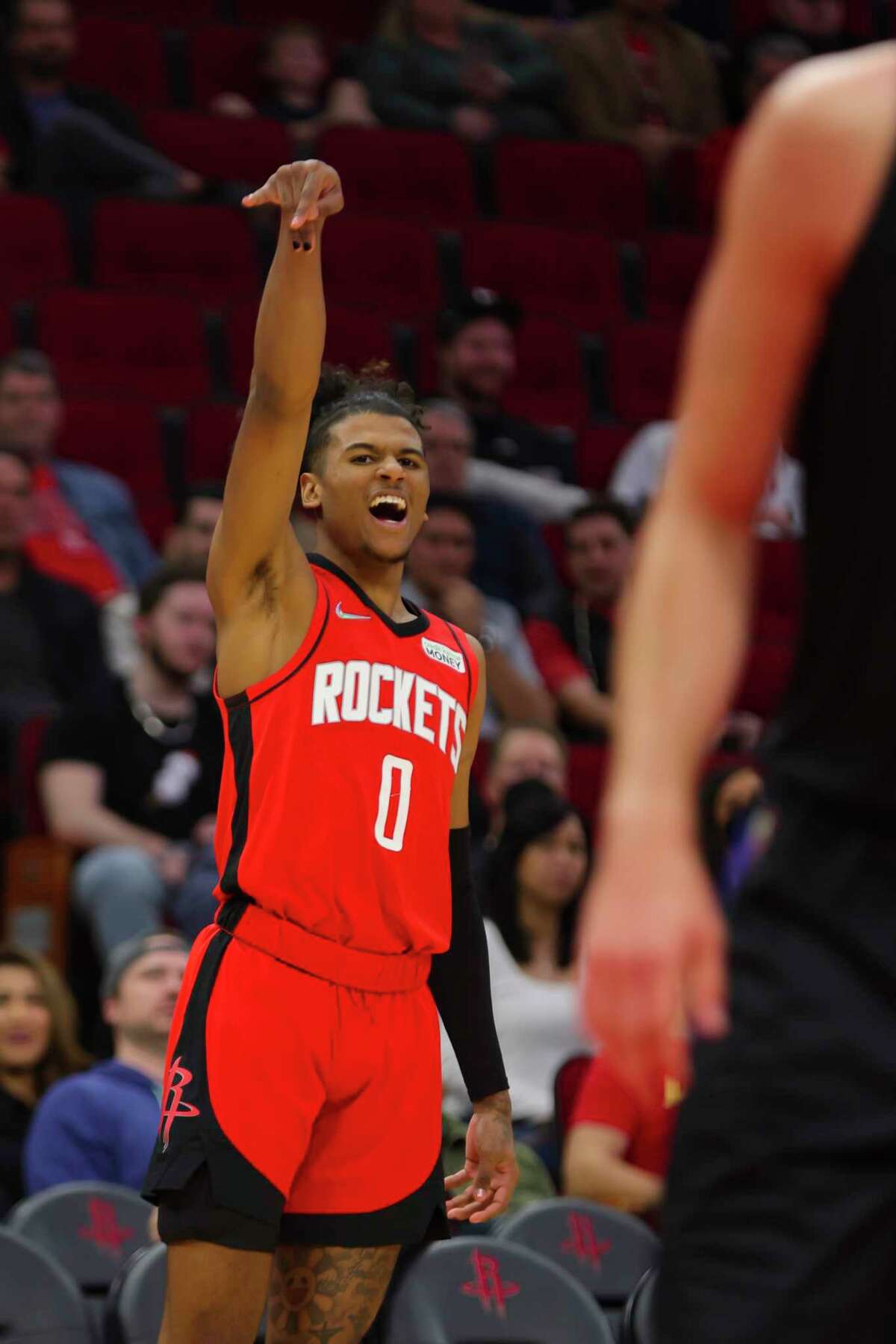 Houston Rockets guard Jalen Green (0) reacts to a shot during the second half of an NBA game between the Houston Rockets and Los Angeles Clippers, Tuesday, March 1, 2022, at Toyota Center in Houston.