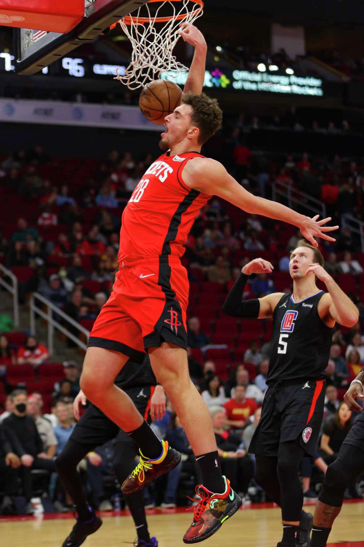 Houston Rockets center Alperen Sengun (28) dunks during the second half of an NBA game between the Houston Rockets and Los Angeles Clippers, Tuesday, March 1, 2022, at Toyota Center in Houston.