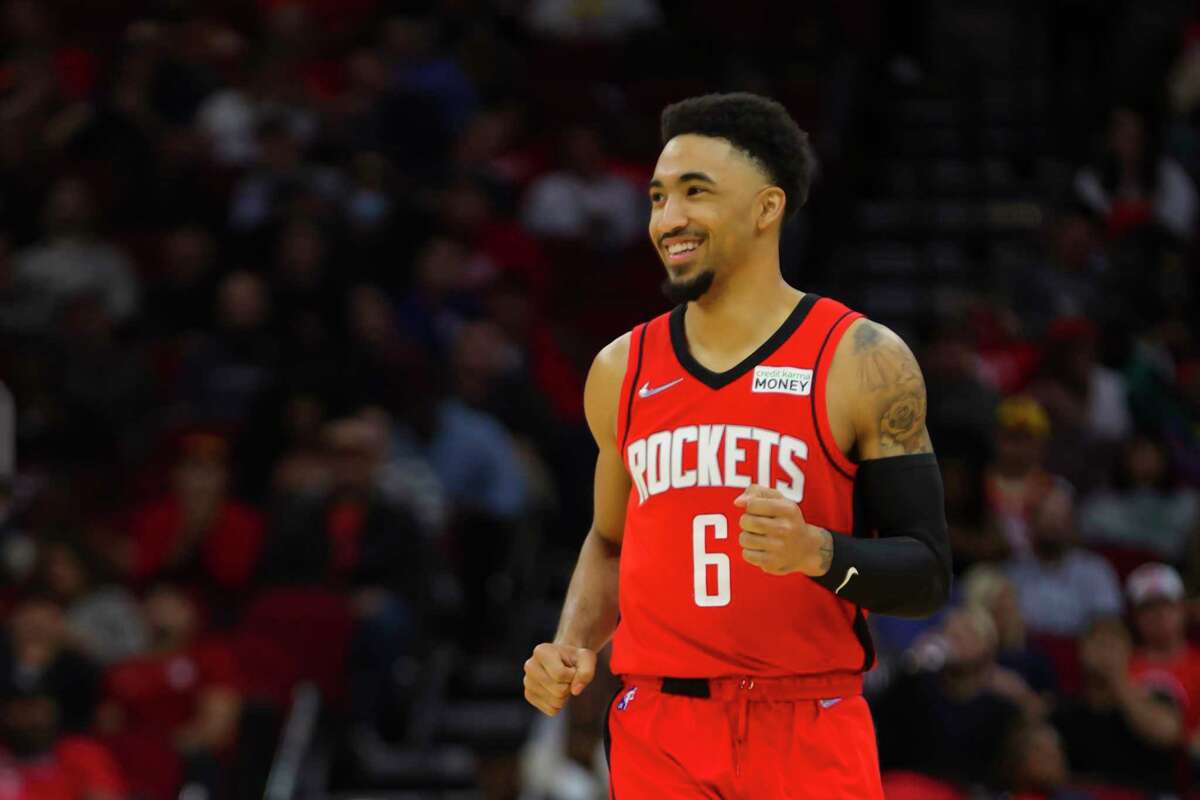 Houston Rockets forward Kenyon Martin Jr. (6) smiles after hitting a three point shot during the second half of an NBA game between the Houston Rockets and Los Angeles Clippers, Tuesday, March 1, 2022, at Toyota Center in Houston.