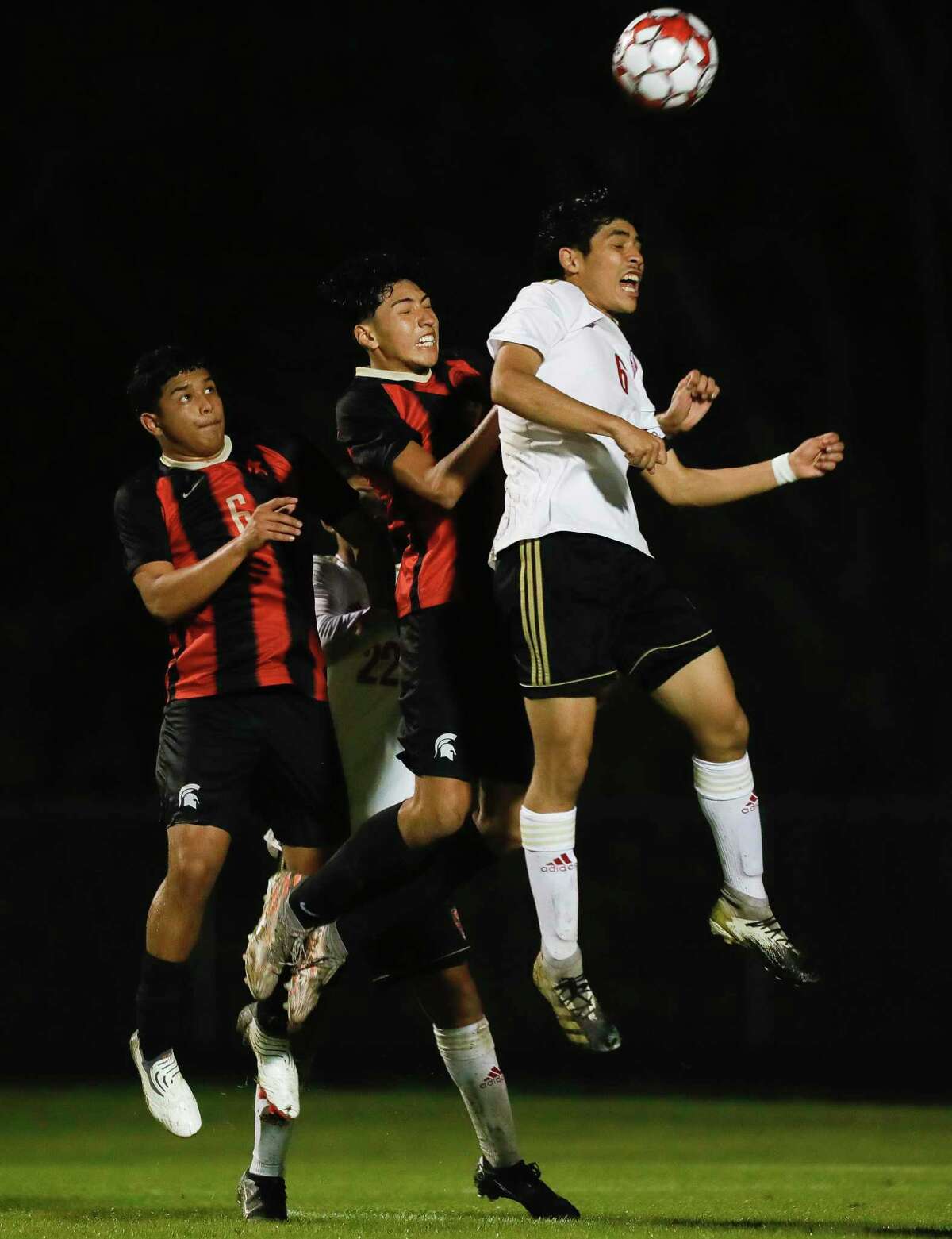 Porter’s Victor Avila (6) heads a corner kick away from the goal during the second period of a high school soccer match at Porter High School, Tuesday, Feb. 1, 2022, in Porter.