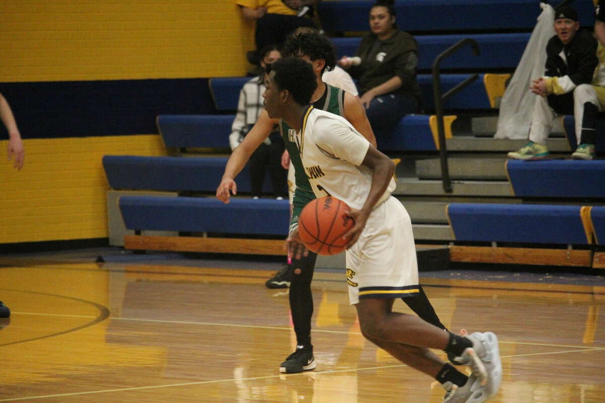 Baldwin's Carmelo Lindsey heads to the basketball in recent action.