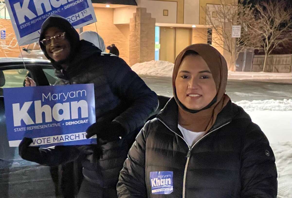 Maryam Khan poll standing Tuesday night outside a polling place on Windsor Avenue in Windsor.