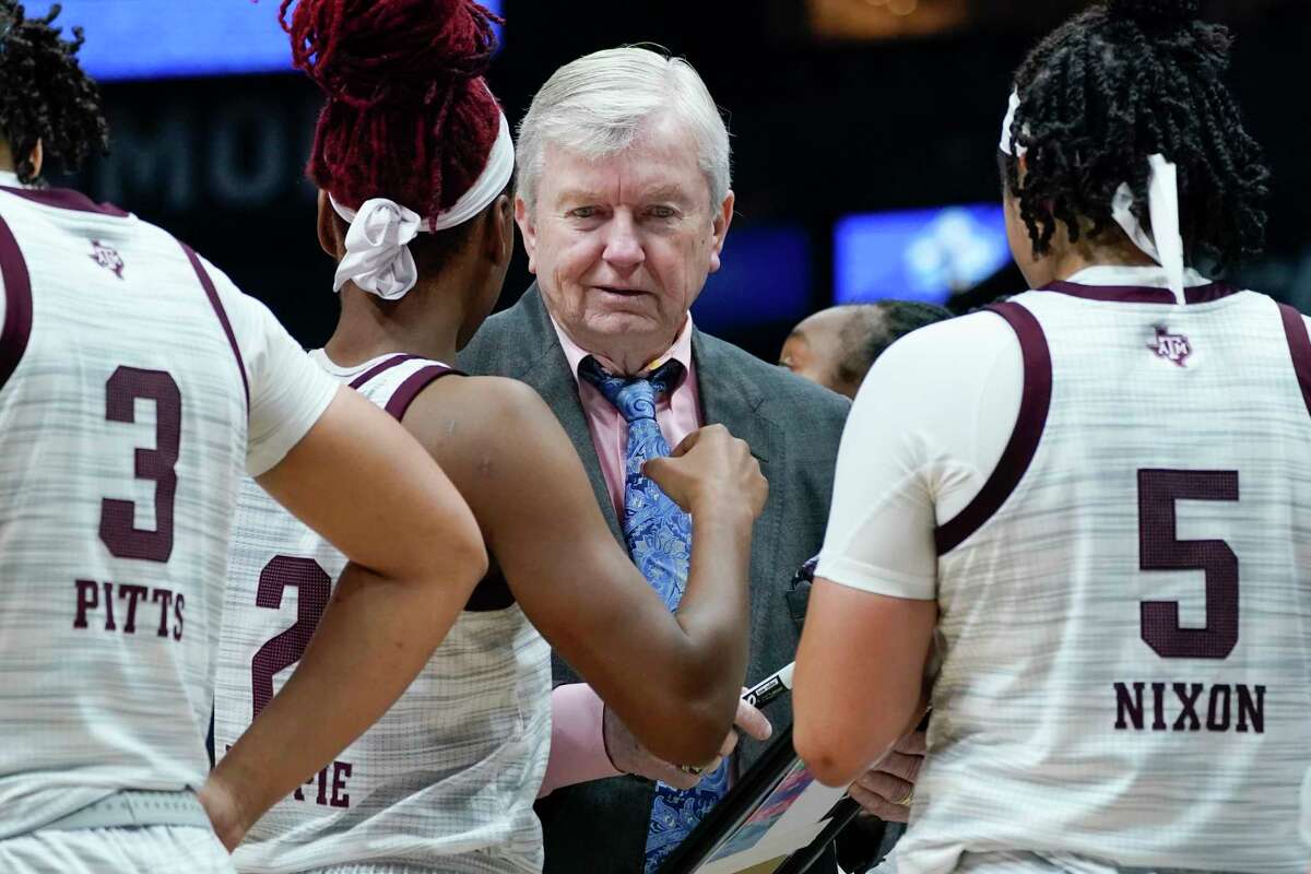 Texas A&M head coach Gary Blair talks with his players in the first half of an NCAA college basketball game against Vanderbilt at the women's Southeastern Conference tournament Wednesday, March 2, 2022, in Nashville, Tenn. (AP Photo/Mark Humphrey)