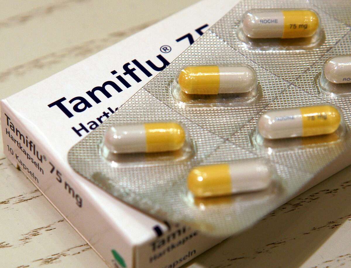 This Wednesday, March 15, 2006 file photo shows the antiviral drug Tamiflu. The World Health Organization says healthy people who catch swine flu don't need antiviral drugs like Tamiflu. In new advice issued to health officials on Friday, Aug. 21, 2009, the U.N. agency said doctors don't need to give Tamiflu to healthy people who have mild to moderate cases of swine flu. WHO said the drug should definitely be used to treat people in risk groups who get the virus. That includes children less than five years old, pregnant women, people over age 65 and those with other health problems like heart disease, HIV or diabetes. The new advice contradicts government policies such as those in Britain, which has been giving out Tamiflu to all people suspected of having swine flu.