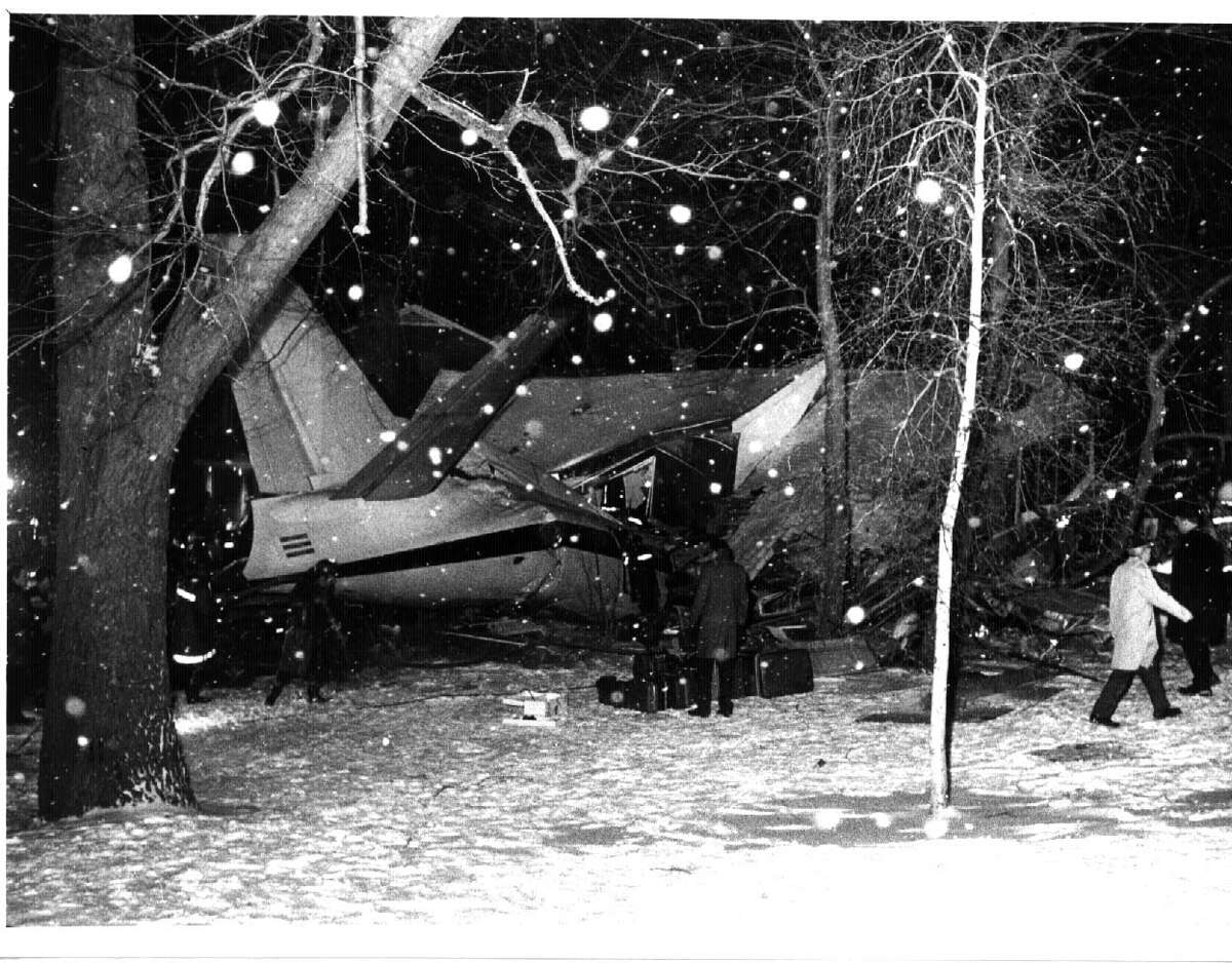 The back end of the Mohawk Airlines plane that crashed into a home on Edgewood Avenue in Albany can be seen in this photo from the night of March 3, 1972. The pilot, copilot, several passengers and a person in the house were killed.