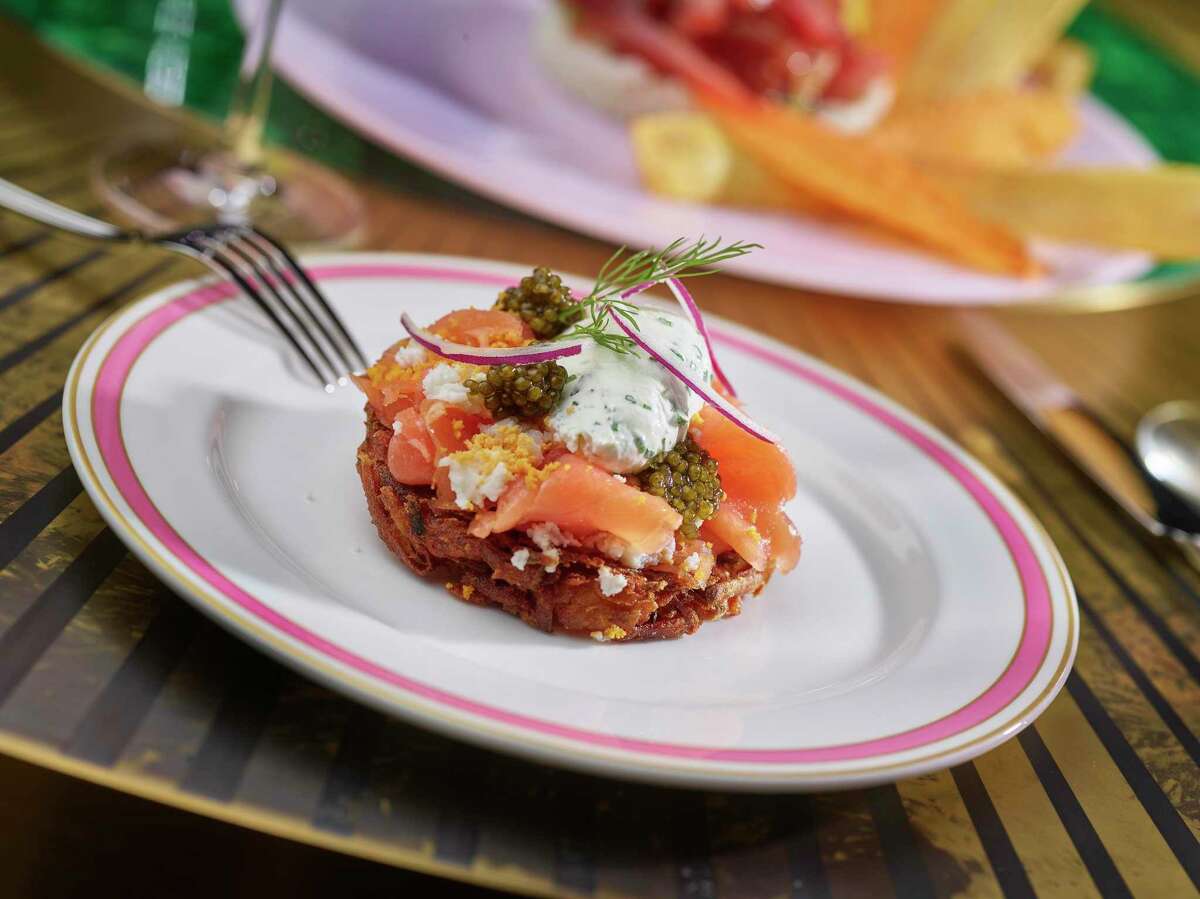Delilah, the hot supper club at Wynn Las Vegas offers an appetizer of the smoked salmon potato latke dotted with caviar.